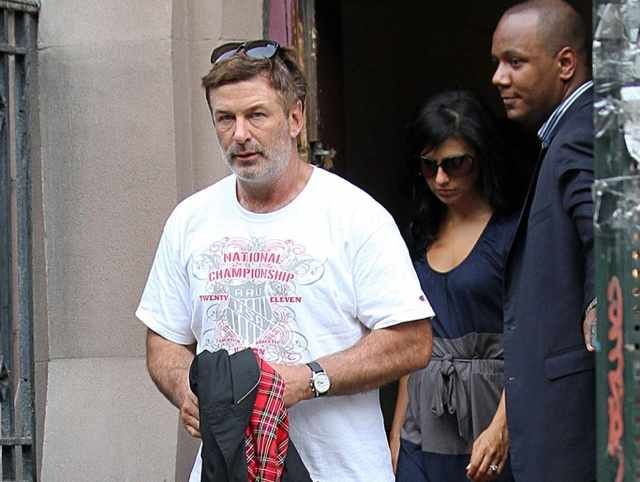 Alec Baldwin, followed by fiancee Hillaria Thomas, leaves Old St. Patrick's Cathedral